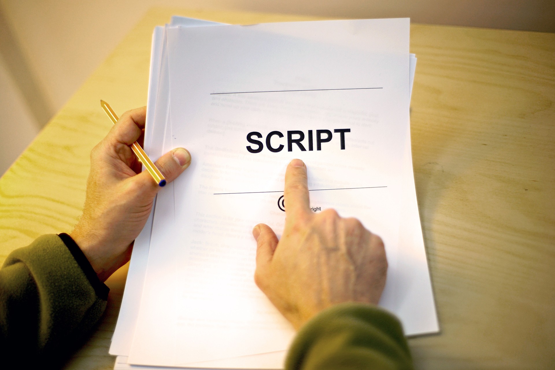 Screen writer interviewing with hard copy script